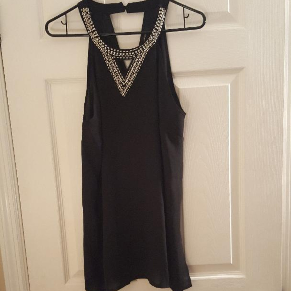 Black sleeveless blouse w/ embellishment neckline